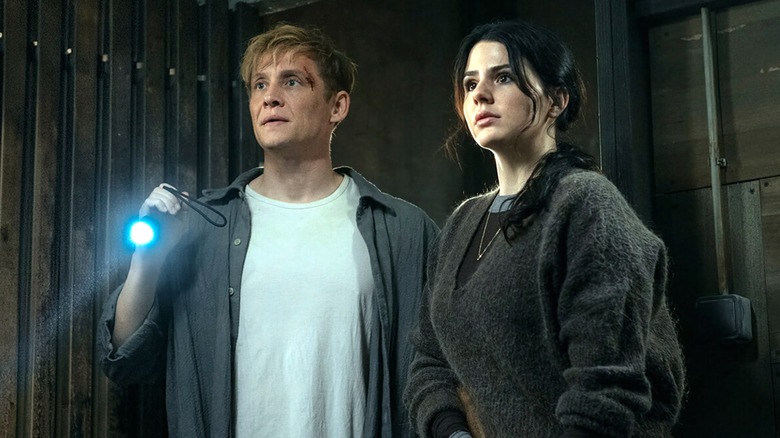 Tim and Liv work together to explore their apartment complex in Brick