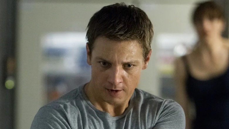 Jeremy Renner as Aaron Cross looking down