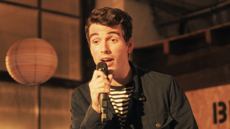 Corey Mylchreest as Jamie Davenport performs karaoke in My Oxford Year