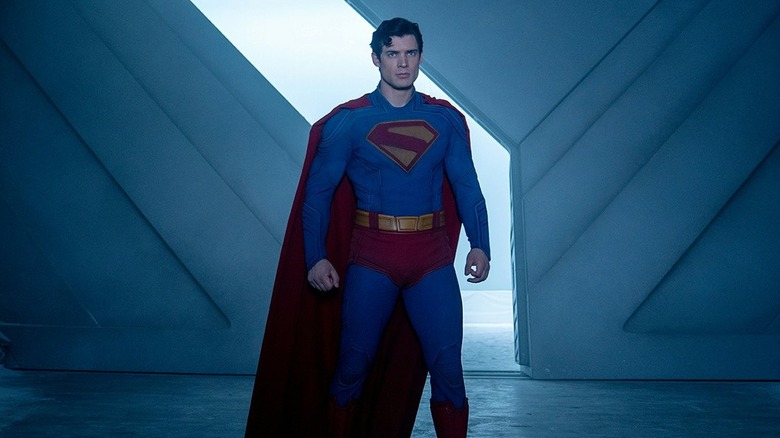 David Corenswet as Superman standing in his Fortress of Solitude looking up in Superman