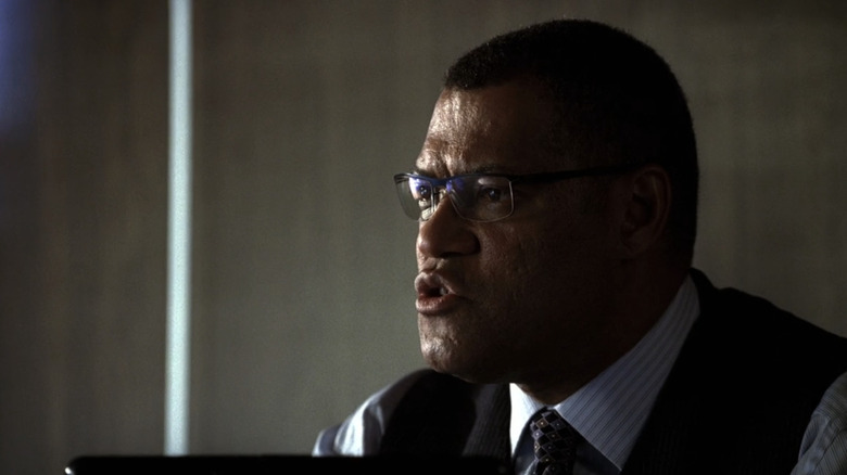 Laurence Fishburne as Raymond Langston talks as he sits behind a computer screen in CSI